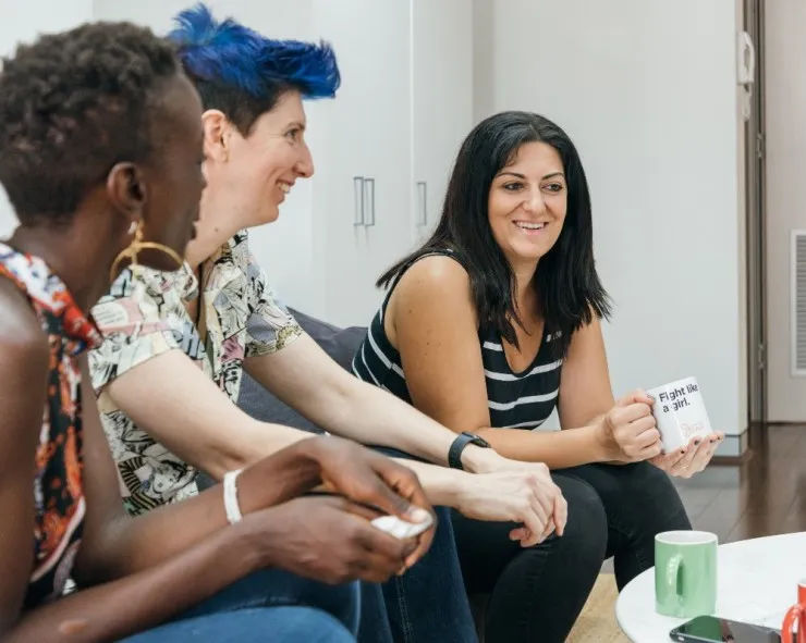 Lookahead recruiters chatting on a couch